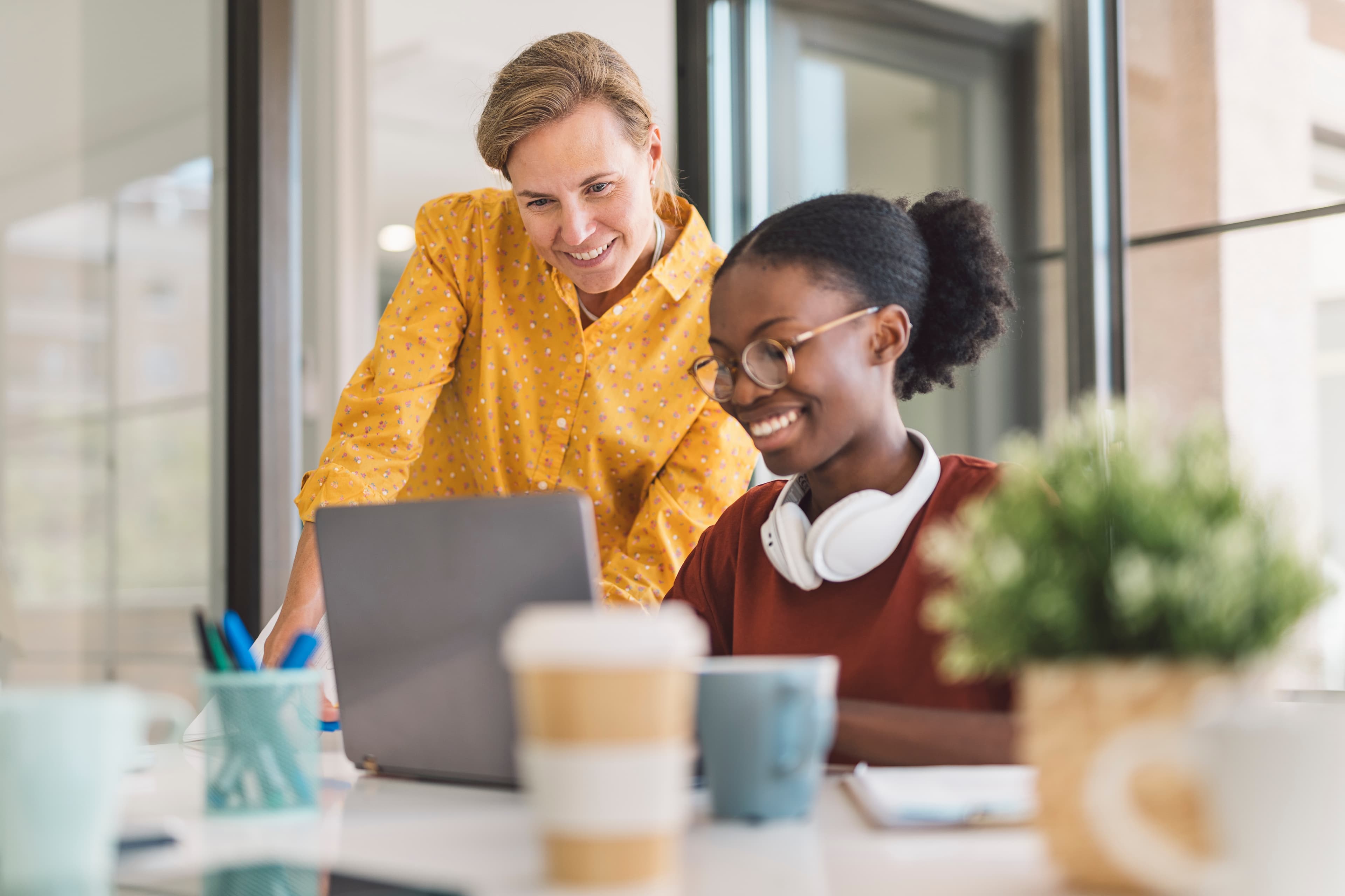 Businessman pointing graphs symbols