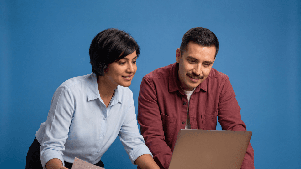 Woman man laptop looking interested