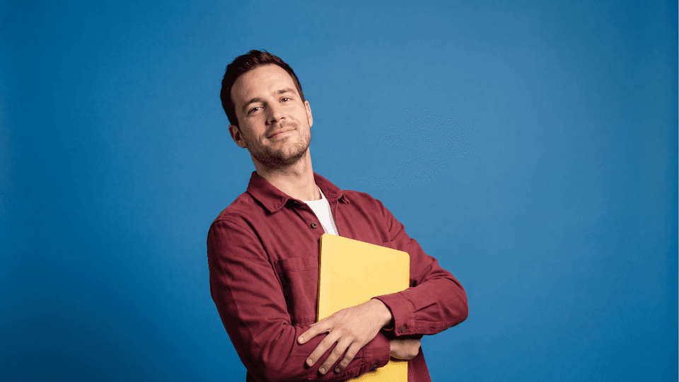 man confident laptop