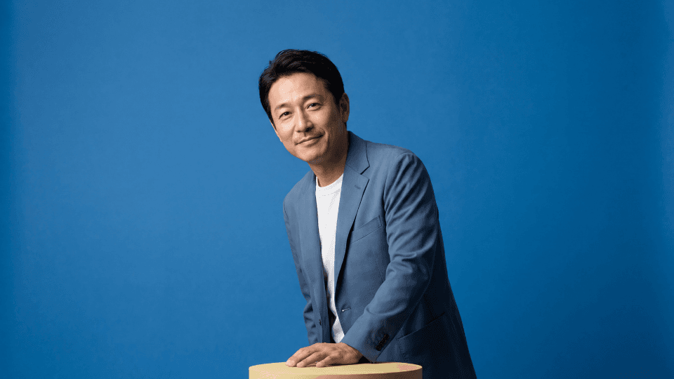 Man smiling leaning standing